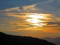 Sunset or twilight with evening clouds in the sky above the Swiss mountains in the Uri Alps massif, Kerns - Canton of Obwald Royalty Free Stock Photo