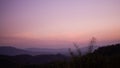 Sunset twilight gradient purple pink night sky with mountain