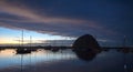 Sunset At Twilight Over Morro Bay Harbor Boats And Morro Rock On The Central California Coast In California USA