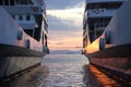 Sunset in between two ferries at Igoumenitsa, Greece. Royalty Free Stock Photo