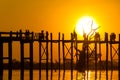 Sunset at U Bein Teakwood Bridge , Amarapura in Myanmar (Burmar