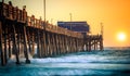 Sunset Under the Pier, Newport Beach, California Royalty Free Stock Photo