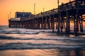 Sunset Under the Pier, Newport Beach, California Royalty Free Stock Photo