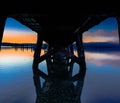 Sunset under the pier Royalty Free Stock Photo