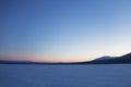 Sunset in Ural Mountains. Winter landscape. lake Zyuratkul
