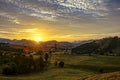 Sunset in valley between hills in Sao Bento do Sapucai - Sao Paulo - Brazil - Panorama photo Royalty Free Stock Photo