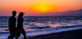 Happy couple in the sunset, Venice beach. Royalty Free Stock Photo
