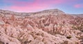 Sunset view from Aktepe Hill over Red valley in Cappadocia, Anatolia, Turkey. Goreme National Park Royalty Free Stock Photo