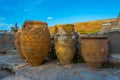 Sunset view of amphoras at the ruins of Knossos palace at Greek