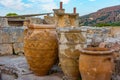 Sunset view of amphoras at the ruins of Knossos palace at Greek