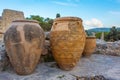 Sunset view of amphoras at the ruins of Knossos palace at Greek