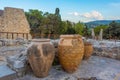 Sunset view of amphoras at the ruins of Knossos palace at Greek