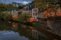 Pastel houses reflecting in Alzette river in Luxembourg old town, UNESCO World Heritage Site and the city wall at sunset Royalty Free Stock Photo