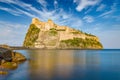 Sunset view of Aragonese Castle near Ischia island, Italy Royalty Free Stock Photo