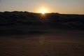 Sunset view of the atacama desert from a sand dune close to the oasis Huacachina, near Ica, Peru Royalty Free Stock Photo