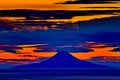 Sunset view of Augustine Volcano from Homer in Alaska