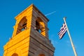 Sunset view of bell tower of St. George chapel on top of Mount Lycabettus, Lycabettus hill, in historic Kolonaki quarter of Athens