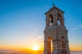 Sunset view of bell tower of St. George chapel on top of Mount Lycabettus, Lycabettus hill, in historic Kolonaki quarter of Athens