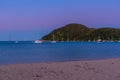 Sunset view of boats mooring at Torrent bay at Abel Tasman national park in New Zealand Royalty Free Stock Photo