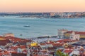 Sunset view of Bridge of 25th April and National sanctuary of Cristo Rei in Lisbon, Portugal Royalty Free Stock Photo