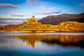 Sunset view of Castle Maol, a ruined castle located near the harbour of the village of Kyleakin, Isle of Skye, Scotland Royalty Free Stock Photo