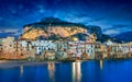 Sunset view of beautiful Cefalu, small resort town on Tyrrhenian coast of Sicily, Italy Royalty Free Stock Photo