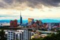 A sunset with a view of central Fukuoka, Japan, with tall modern buildings