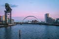 Sunset view of the Clyde Arc or Squinty Bridge and river Clyde