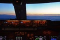 Sunset view of the cockpit of a commercial airplane Royalty Free Stock Photo