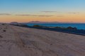 Sunset view of Corralejo sand dunes and Lanzarote from Fuerteventura, Canary islands, Spain Royalty Free Stock Photo