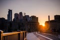 Sunset view of the Downtown Minneapolis Skyline as seen from on the Stone Arch Bridge