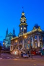 Sunset view of Dunedin town hall and saint paul\'s cathedral in New Zealand Royalty Free Stock Photo