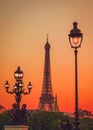 Sunset view of  Eiffel Tower and Alexander III Bridge in Paris, France Royalty Free Stock Photo