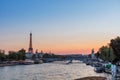 Sunset view of Eiffel tower, Alexander III and Seine river in Paris, France. Architecture and landmarks of Paris. Royalty Free Stock Photo
