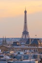 Sunset view of Eiffel Tower with Louvre museum, Notre-Dame cathedral, Parisian rooftops. Famous landmark, icon, travel destination Royalty Free Stock Photo