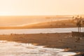 Sunset view of the entrance to Newport Harbor and beaches in Corona del Mar, Newport Beach, California