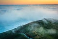 Sunset view of fog over the San Francisco Bay and hills Royalty Free Stock Photo