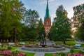 Sunset view of a fountain in front of the Alexander Church in Fi