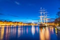 Sunset view of Gamla stan, royal palace and Hostel ship Af Chapman in Stockholm, Sweden