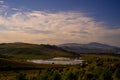 Sunset with a view of the green hills of the Altai republic Royalty Free Stock Photo