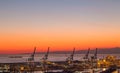 Sunset view of the harbor of the city of Genoa, Italy. Royalty Free Stock Photo