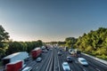 Sunset view heavy traffic moving at speed on UK motorway in England