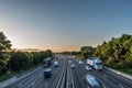 Sunset view heavy traffic moving at speed on UK motorway in England Royalty Free Stock Photo