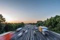Sunset view heavy traffic moving at speed on UK motorway in England Royalty Free Stock Photo