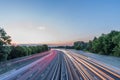 Sunset view heavy traffic moving at speed on UK motorway in England Royalty Free Stock Photo