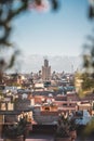 Sunset view of Koutoubia mosque in Marrakesh, Morocco with stork silhouette. Panoramic view of Marrakech with the old