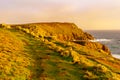 Sunset view of the Lands End coastline landscape, Cornwall Royalty Free Stock Photo