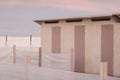 Beach huts sheltered from bulkheads for the winter