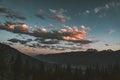 Sunset View from Mount Revelstoke across forest with blue sky and clouds. British Columbia Canada. Royalty Free Stock Photo