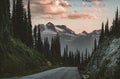 Sunset View from Mount Revelstoke across forest with blue sky and clouds. British Columbia Canada. Royalty Free Stock Photo